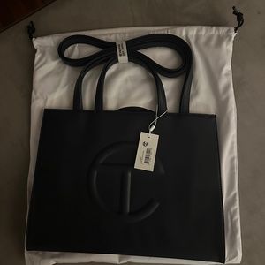 Navy blue telfar (m)